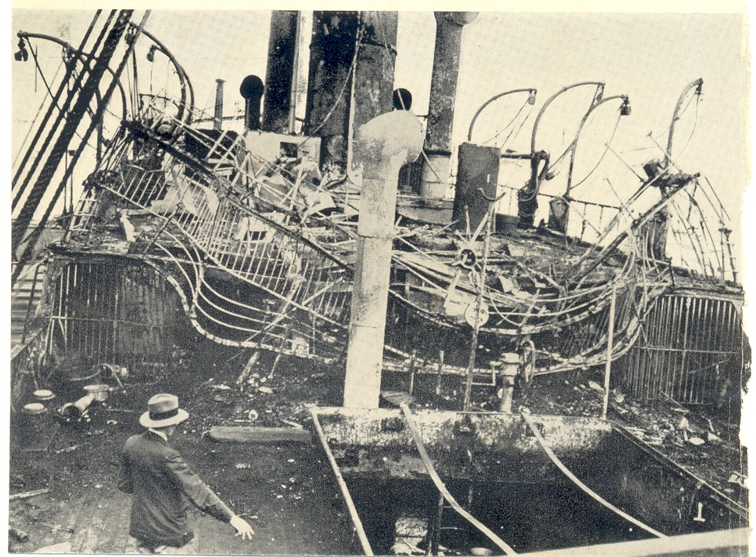 China coaster burnt by pirates 1930s