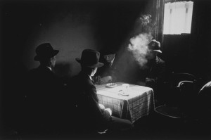 May 1942- A smoke-filled room in a Chinese hostel in Liverpool. Original Publication- Picture Post - 1136 - Chinese Hostel, Liverpool - unpub. Credit- Bert Hardy_Picture Post_Getty Images-4